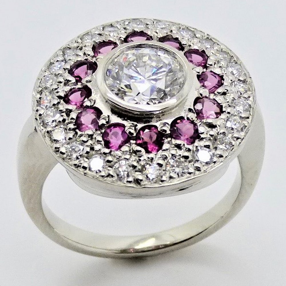 Diamond and ruby cluster engagement ring