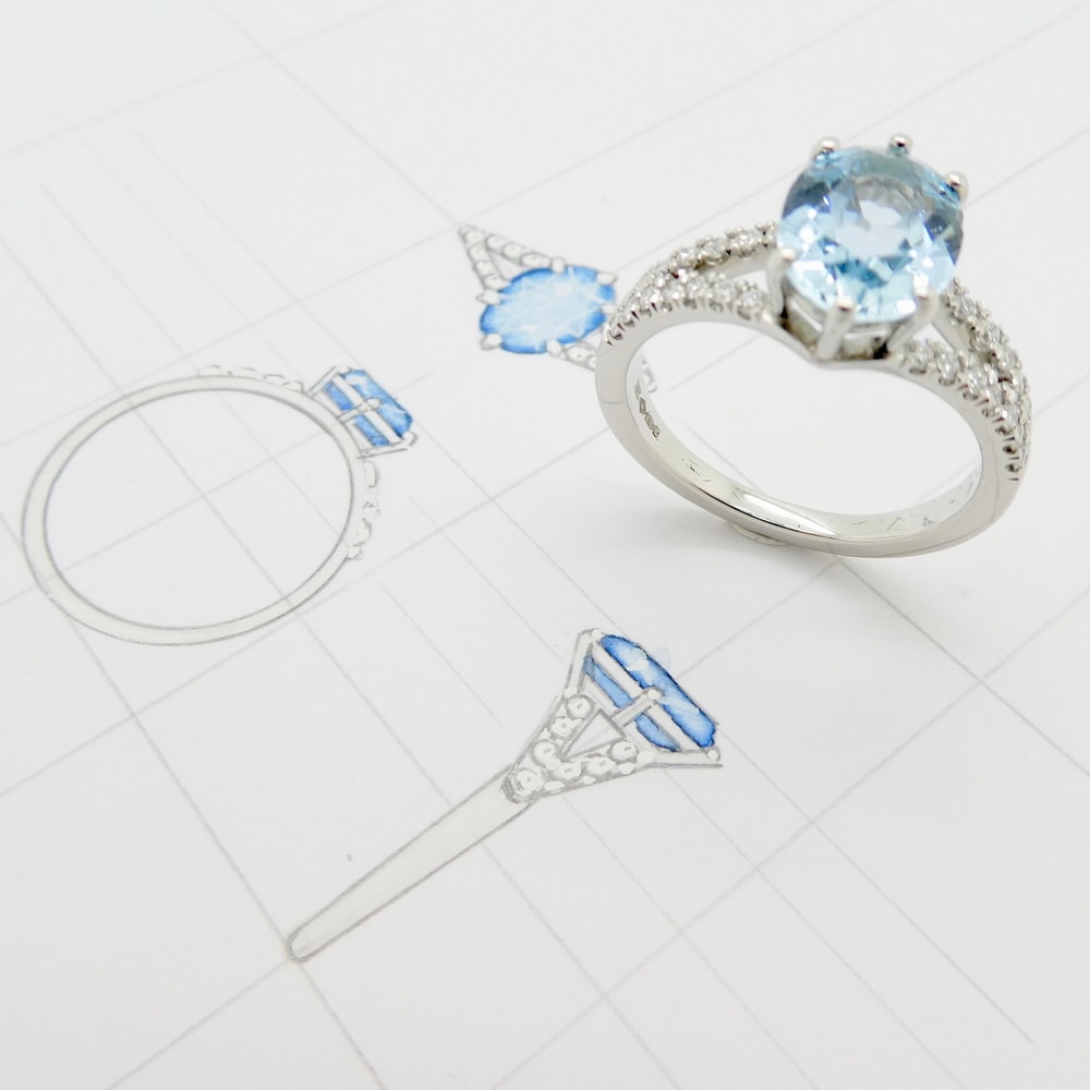 Aquamarine and diamond engagement ring
