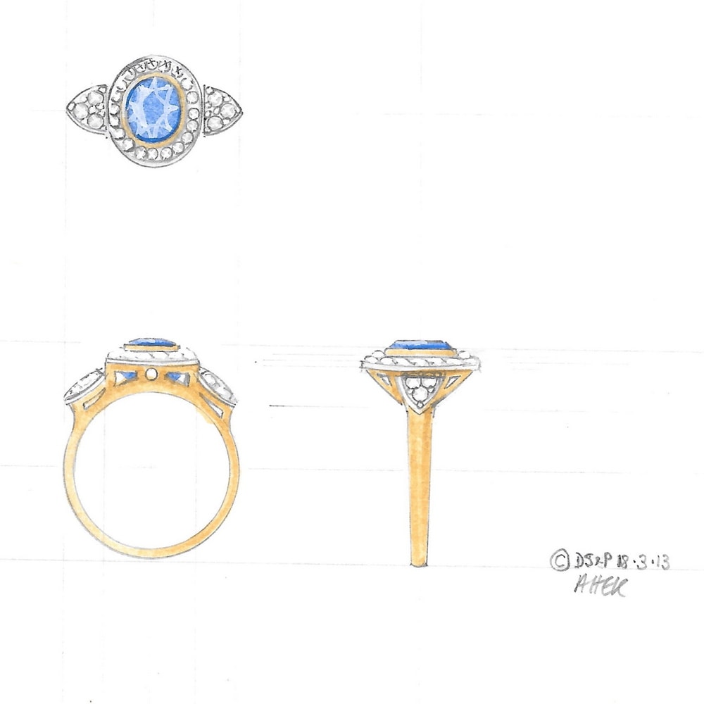 Sapphire and diamond cluster engagement ring