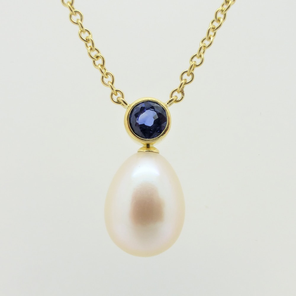 Sapphire and pearl drop pendant yellow gold