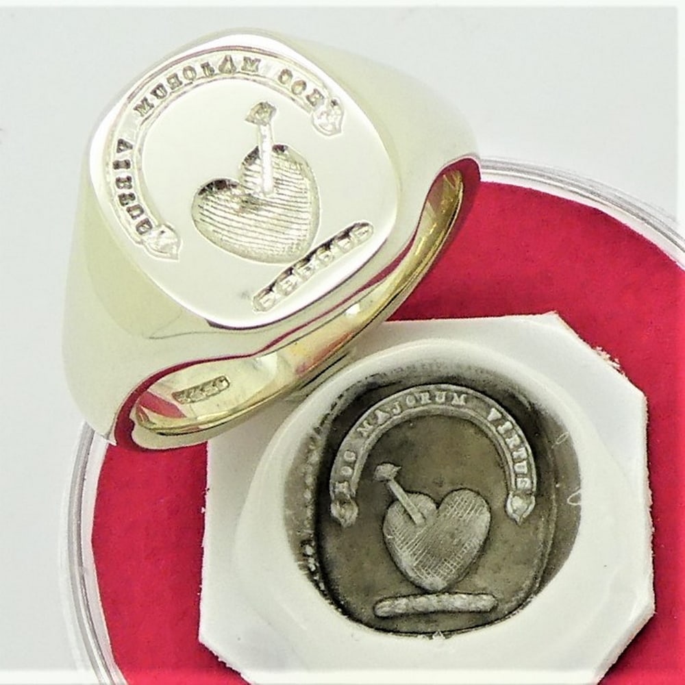 White gold or platinum seal engraved signet ring with crest and motto