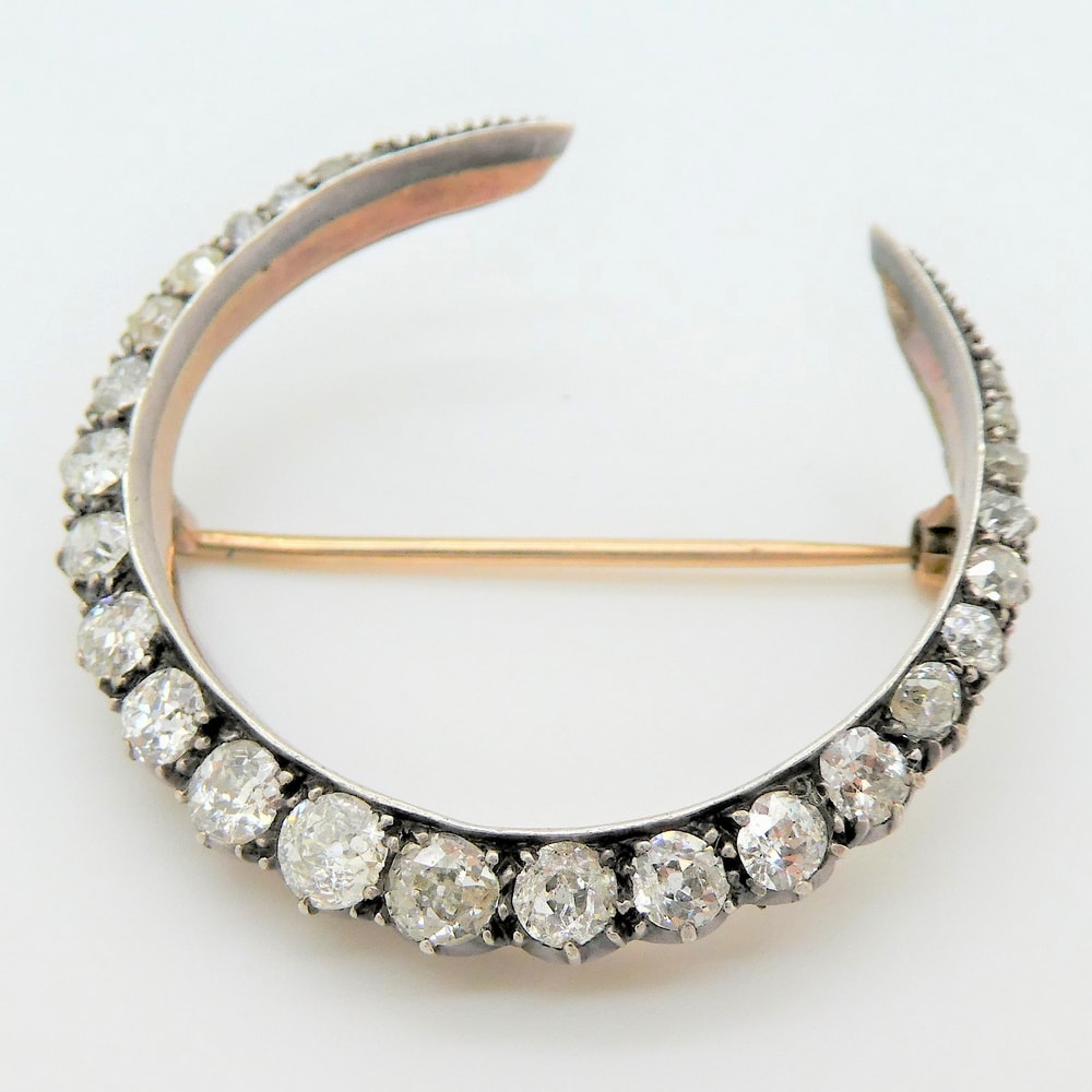 Original antique diamond crescent brooch