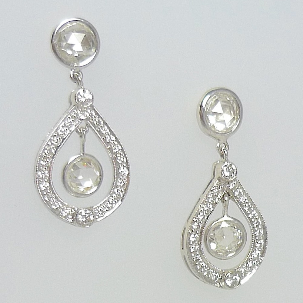 Mine cut diamond drop earrings in platinum