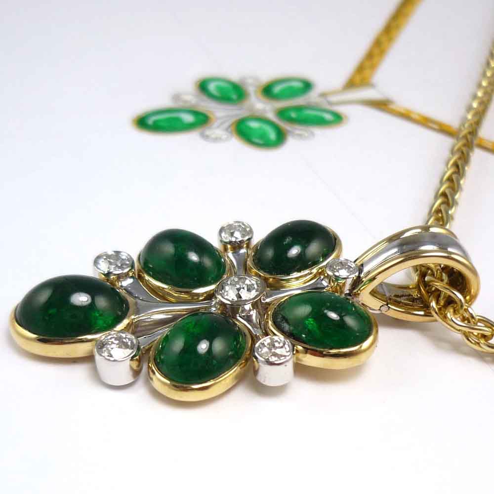 Cabochon emerald and diamond pendant