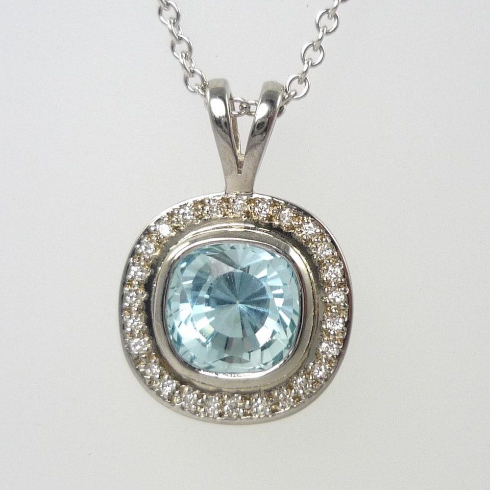Aquamarine and diamond cluster pendant white gold