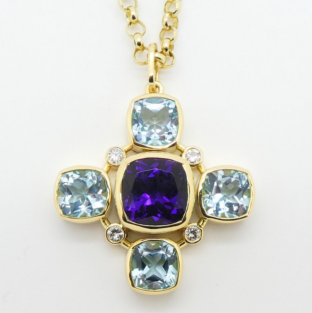 Amethyst blue topaz and diamond cross pendant in 18 carat yellow gold