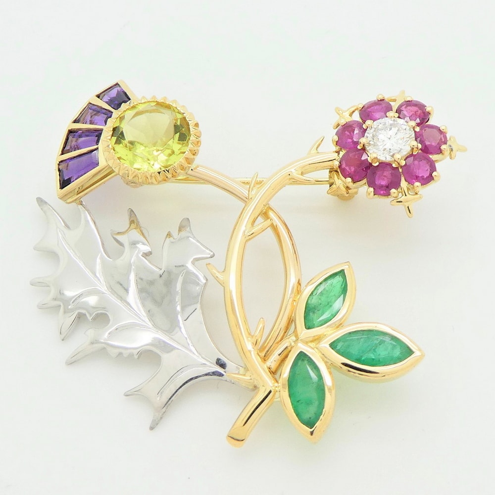 Bespoke brooch with rose and thistle flowers