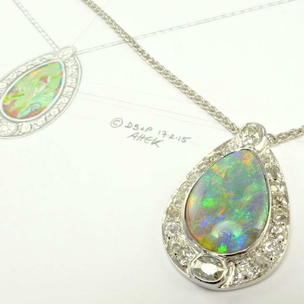 Opal and old cut diamond pendant in white gold