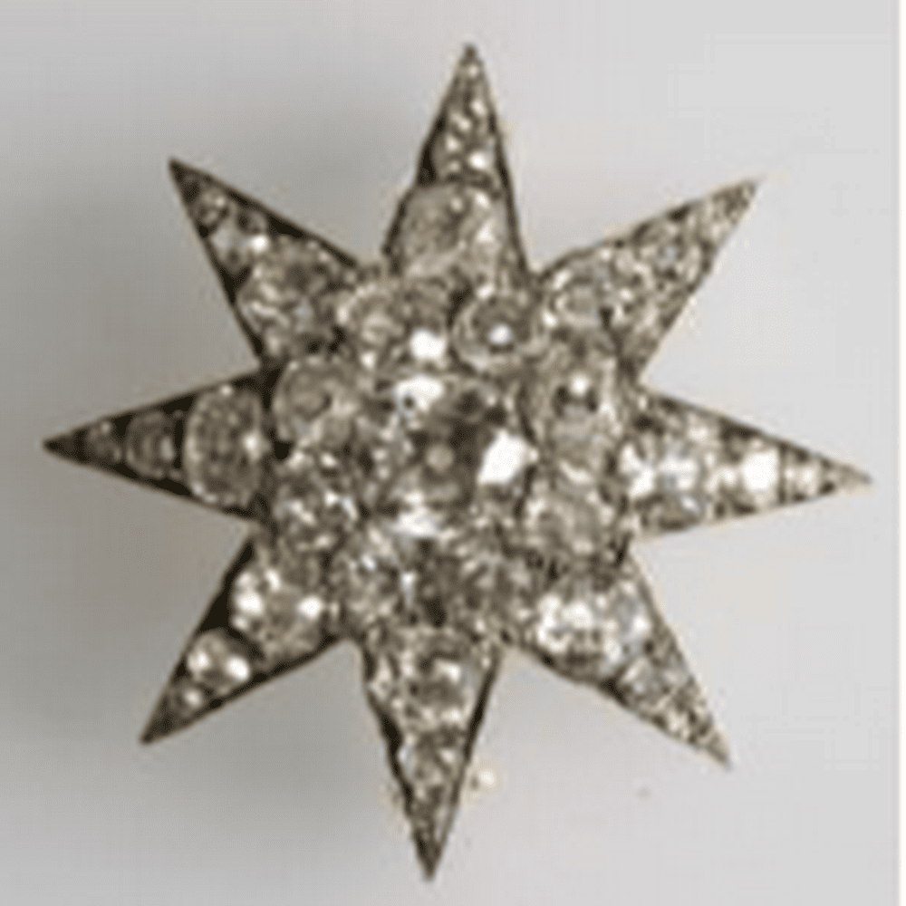 Antique diamond set star brooch