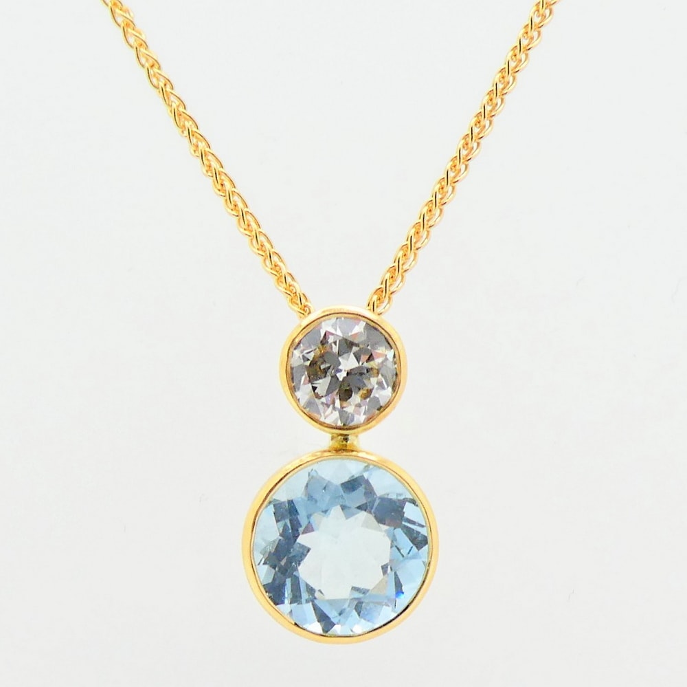 Diamond and aquamarine drop pendant yellow gold