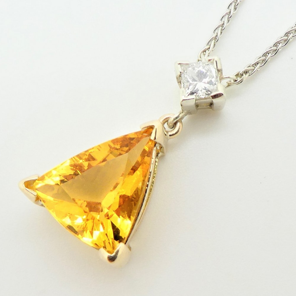 Yellow sapphire and diamond pendant in white & yellow gold