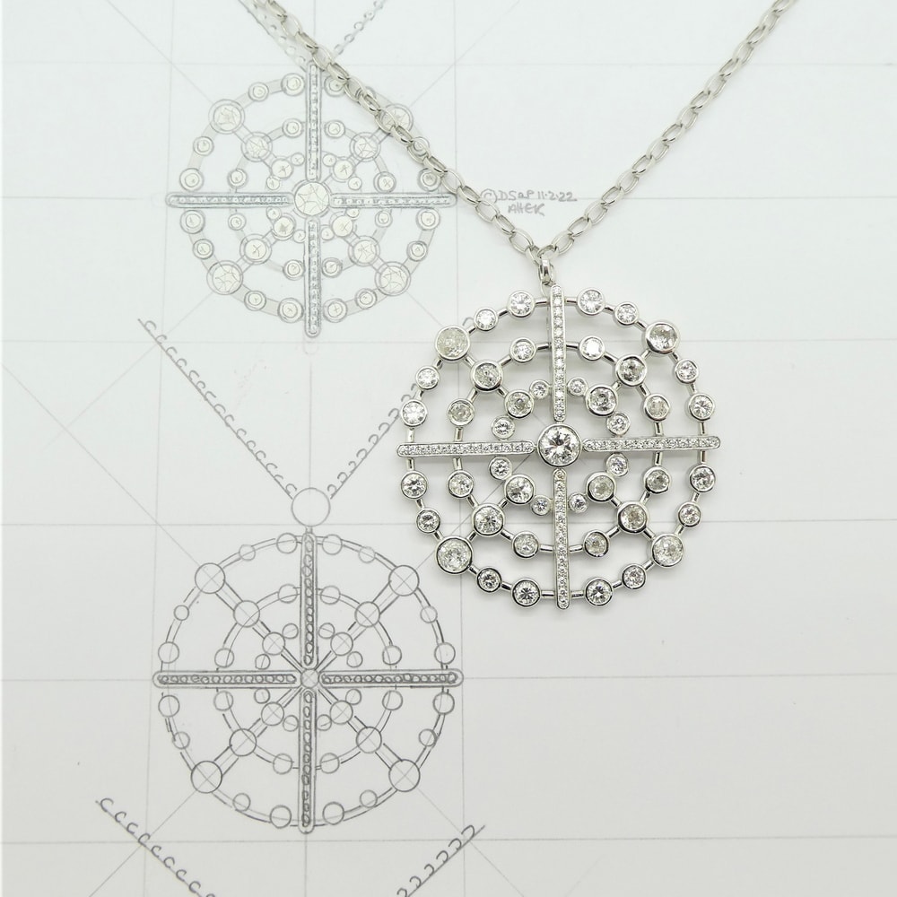 Diamond concentric circle pendant in platinum