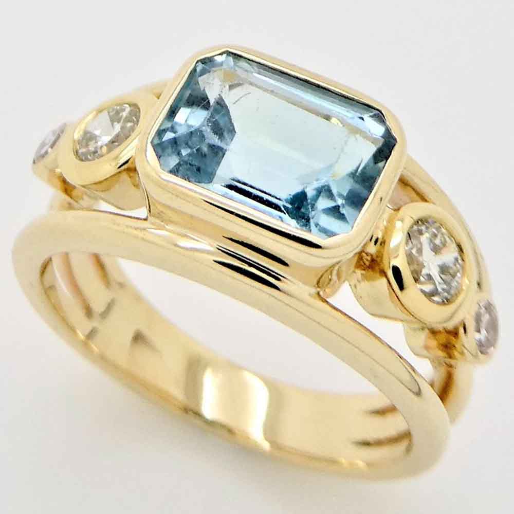 Aquamarine & diamond dress ring in 18 carat yellow gold