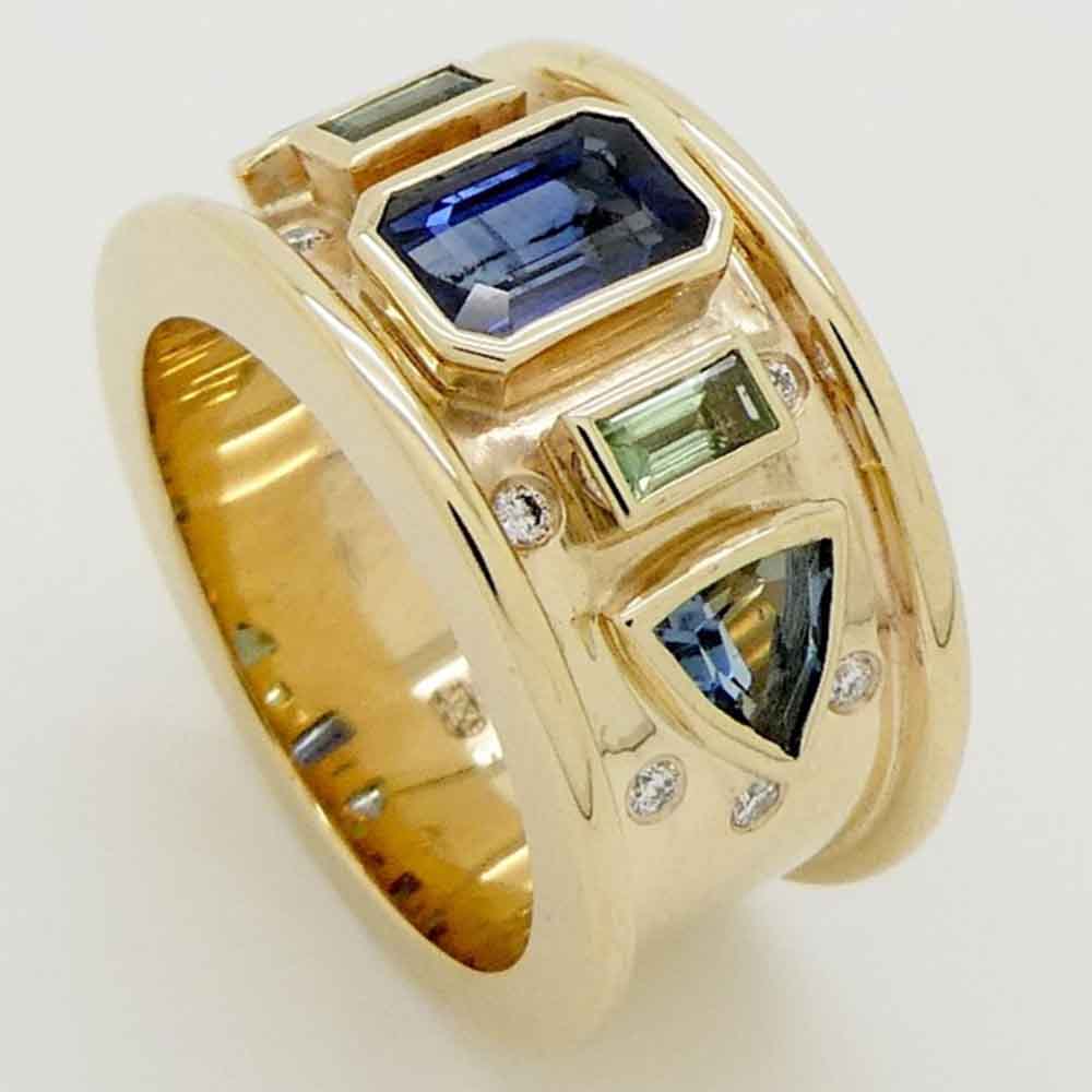 Sapphire alexanderite &diamond dress ring in yellow gold