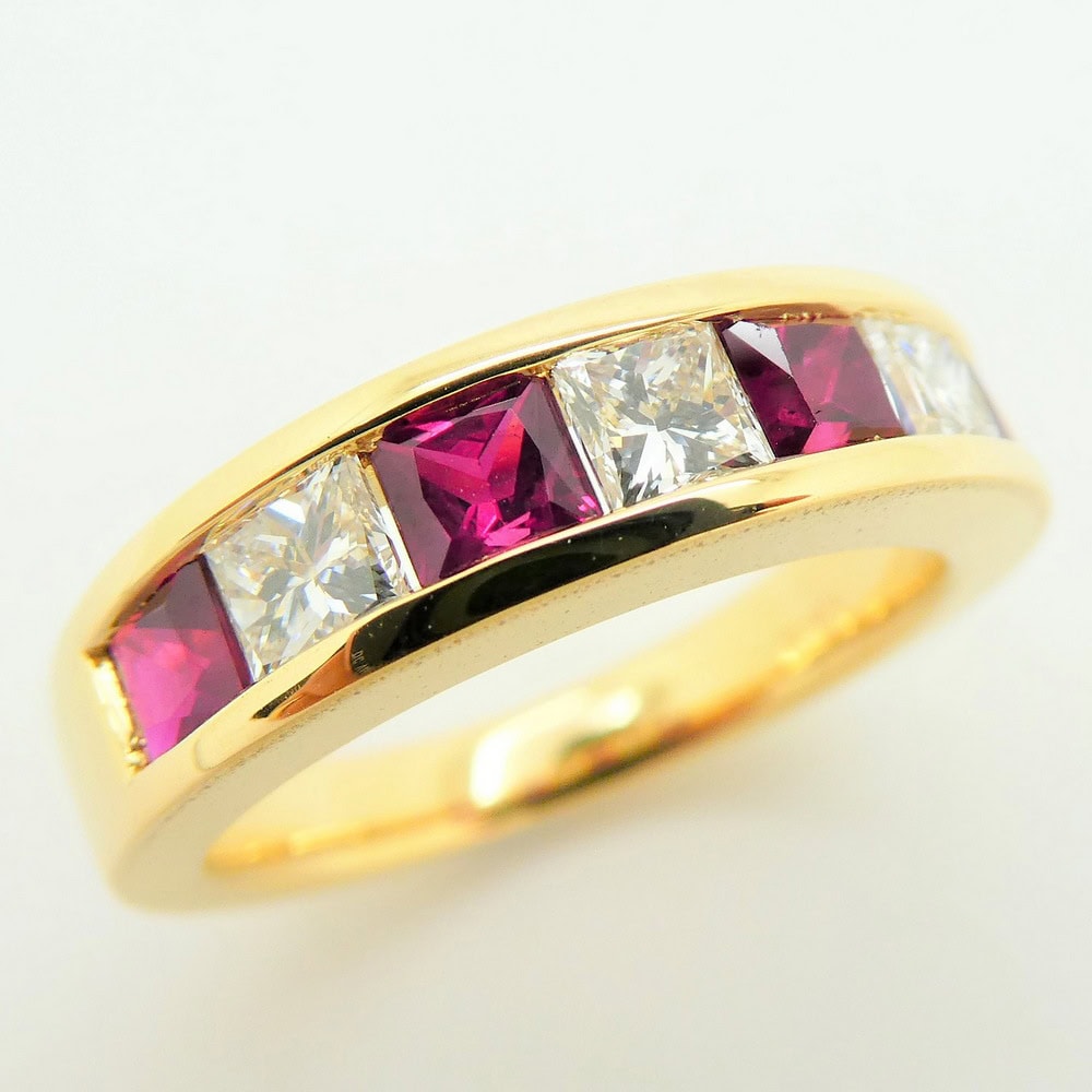 Ruby & diamond channel set eternity ring yellow gold