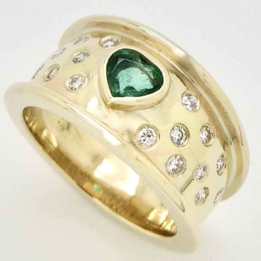 Emerald & diamond yellow gold dress ring