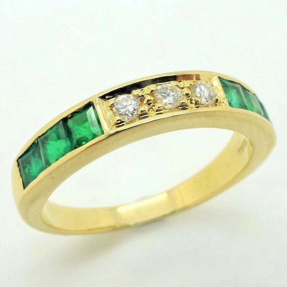 Emerald & diamond eternity ring yellow gold