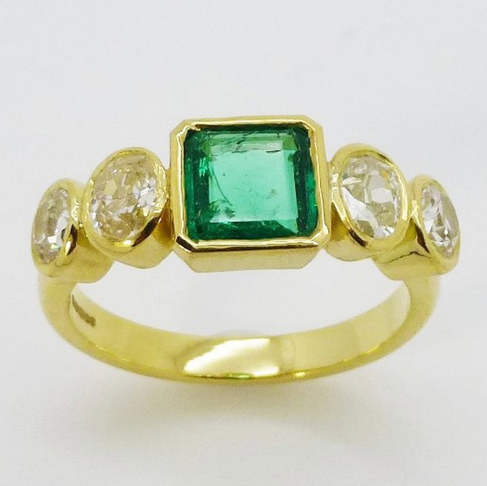 Emerald & diamond dress ring yellow gold