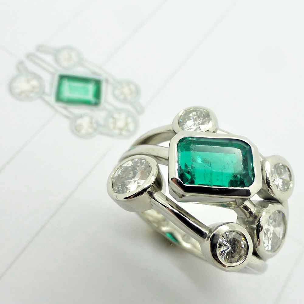 Emerald & diamond bubble style dress ring in white gold