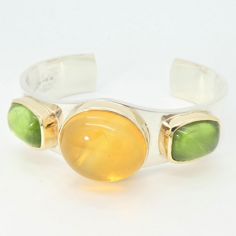 Citrine and peridot bangle in silver and gold