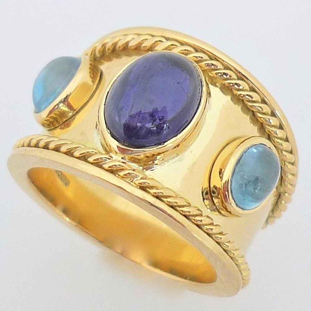 Cabochon sapphire & blue topaz bombe dress ring yellow gold