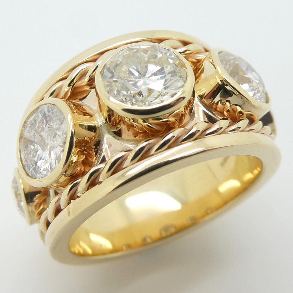 Diamond bombe yellow gold dress ring