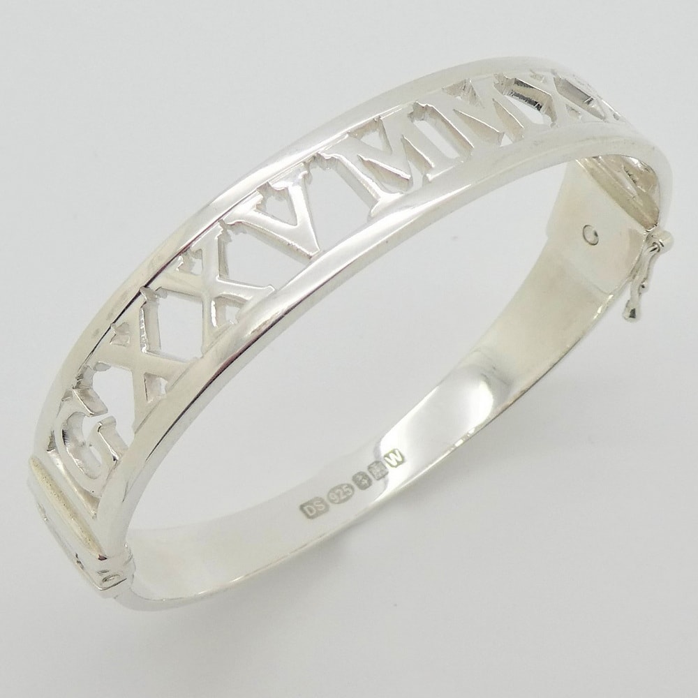 Silver bangle with pierced out date & initials
