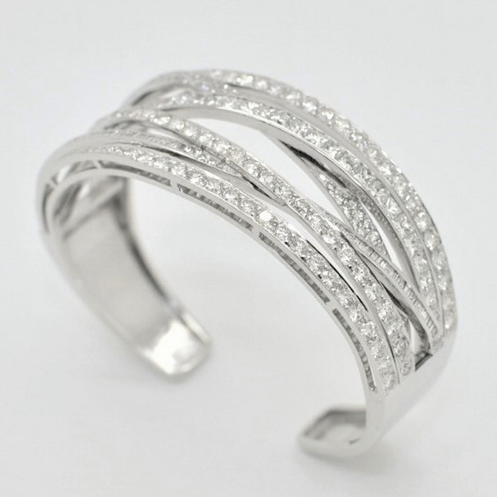 Diamond set cuff bangle in platinum