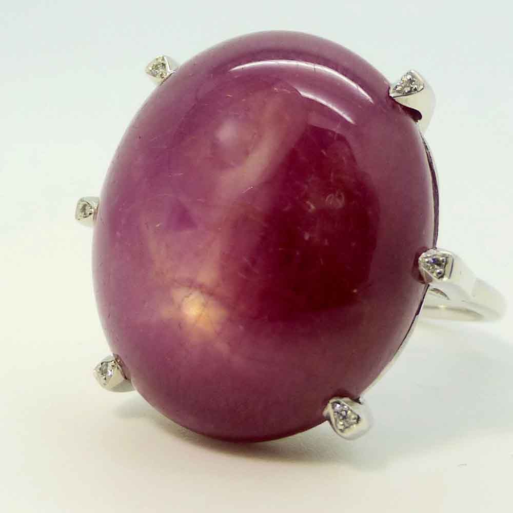 Star ruby dress ring diamond set claws