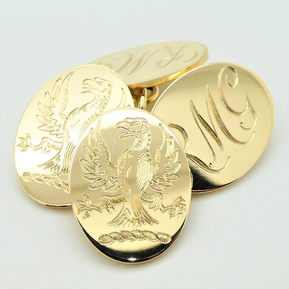 Gold cufflinks hand engraved with family crest and initials