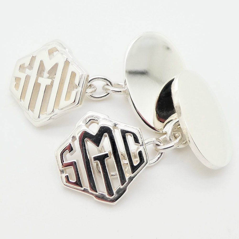 Bespoke silver cufflinks for the St Moritz Toboggan Club for Cresta riders