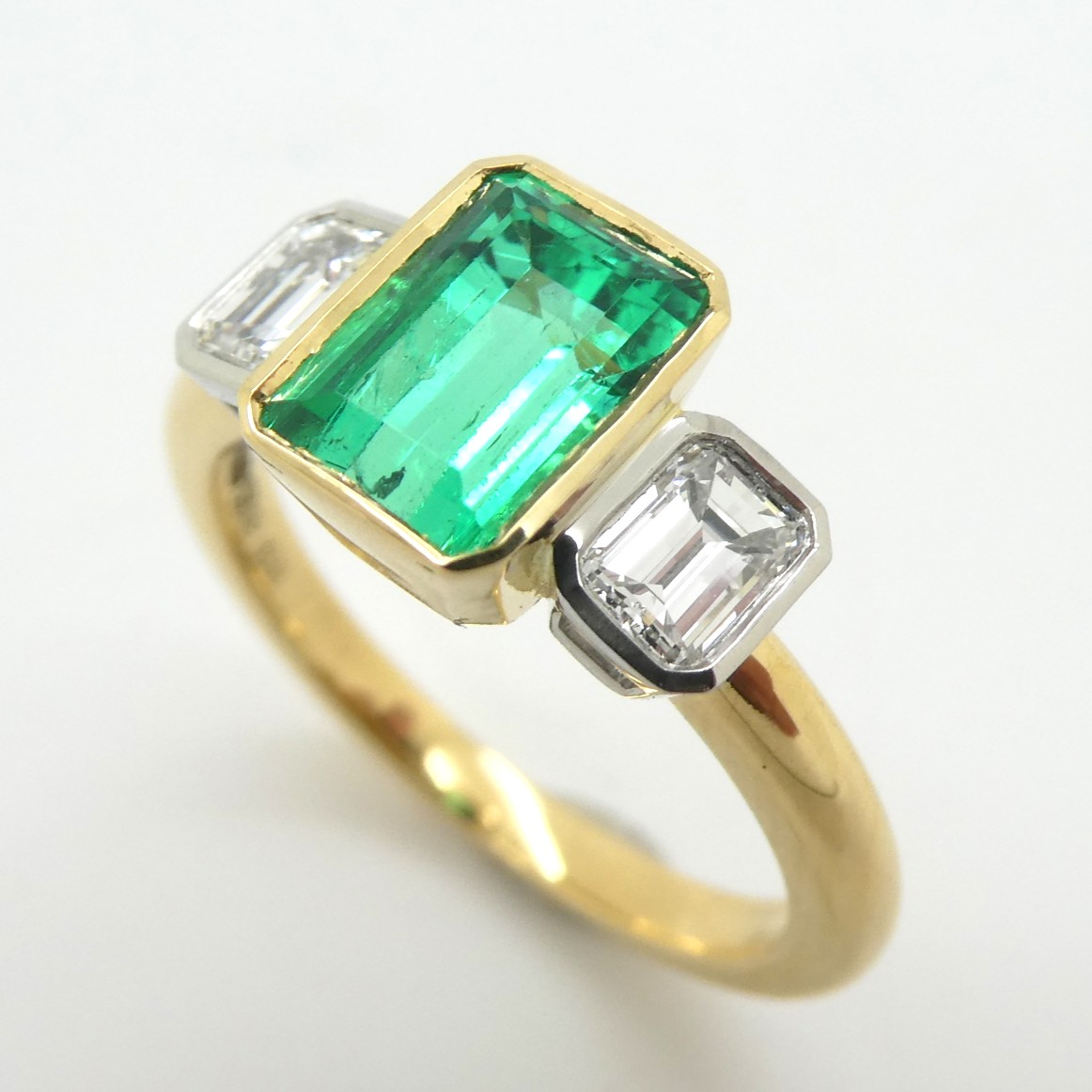 Colombian emerald and diamond engagement ring